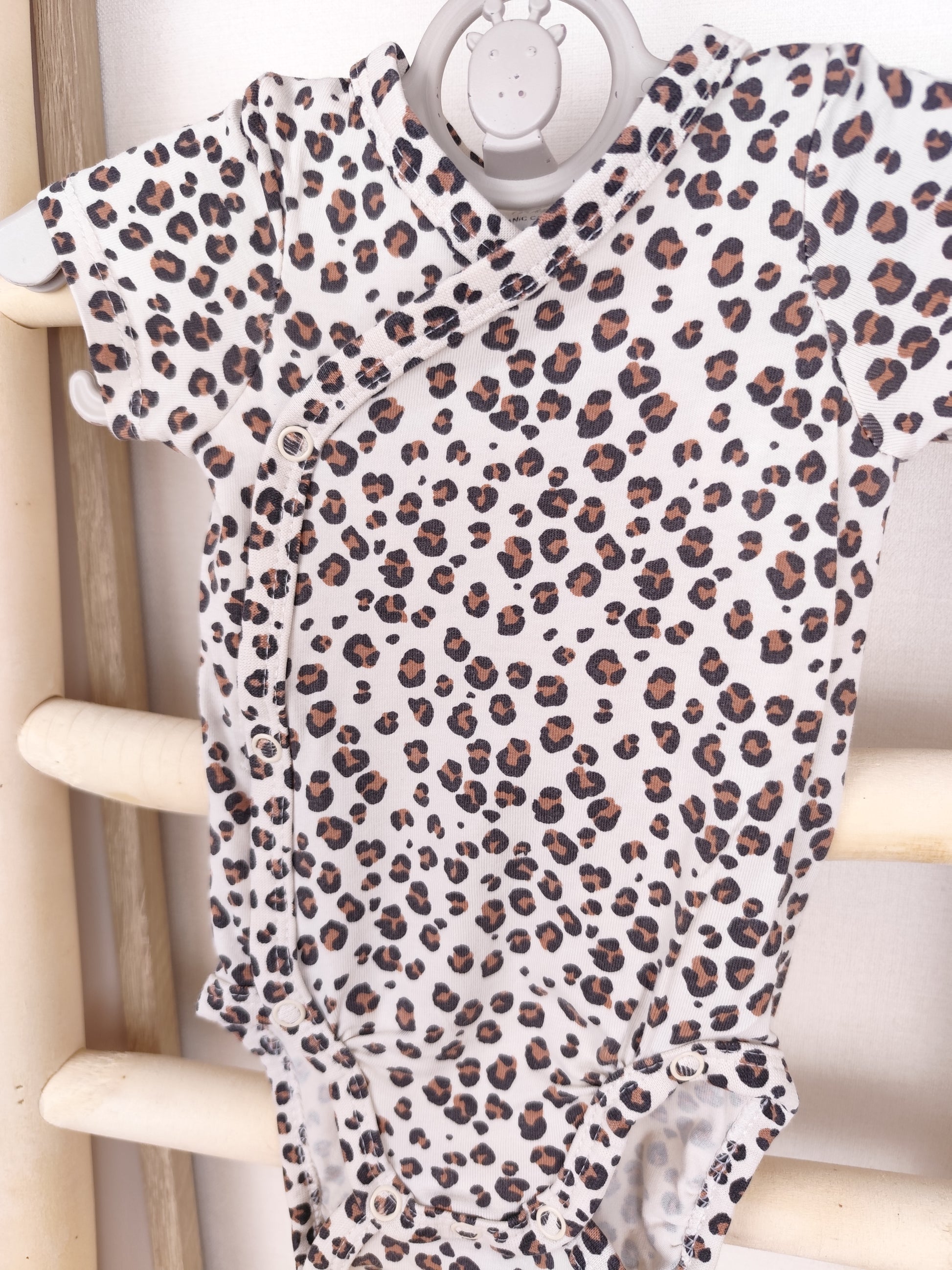 H&M Body - Leo - Größe 56